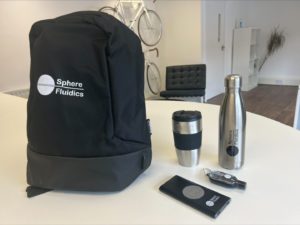 Onboarding pack: bag, coffee cup, drinks bottle, wireless charger