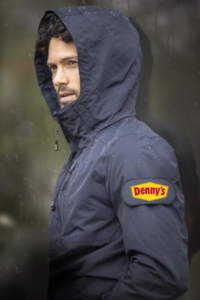 Man wearing Circular Kai Unisex Environmentally Friendly Lightweight Jacket with hood up